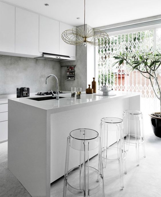 Ghost bar stools in the kitchen