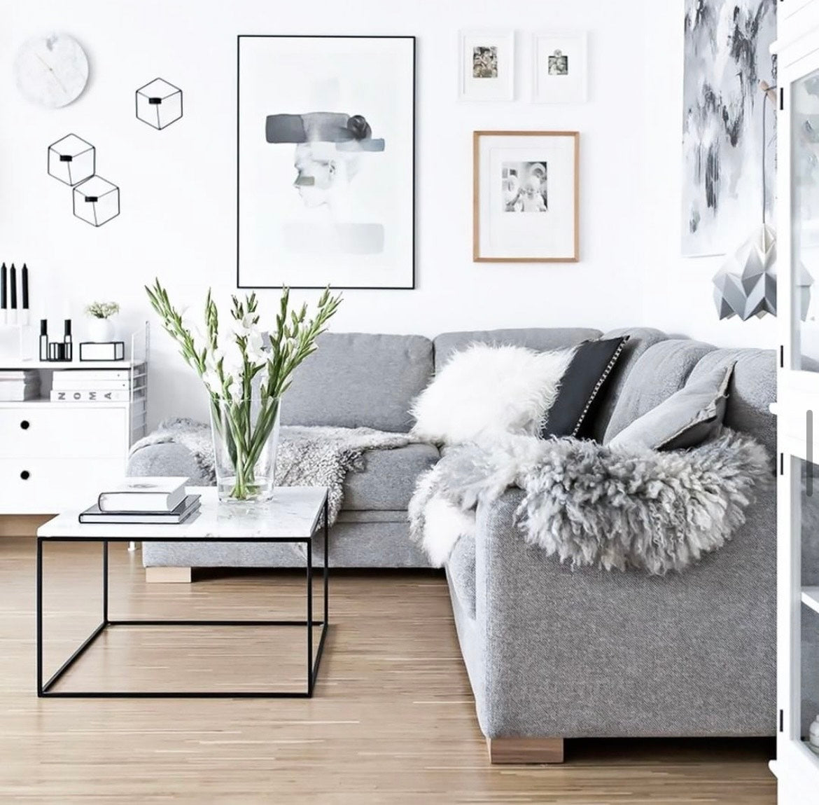 White Marble and Black Metal Contemporary Square Coffee Table in modern living room.