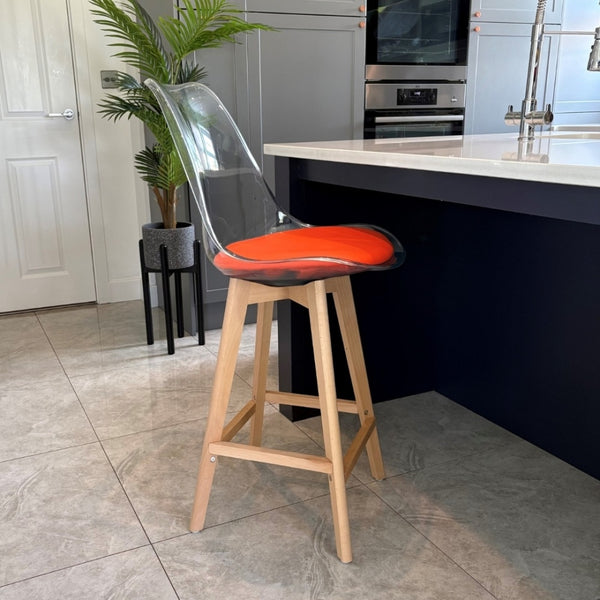 Soho Clear and Orange Plastic Bar Stool with Light Wood Legs