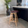 Soho Clear and Aubergine Plastic Bar Stool with Light Wood Legs