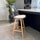 Soho Clear and White Plastic Bar Stool with Light Wood Legs