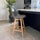 Soho Clear and Dark Grey Plastic Bar Stool with Light Wood Legs