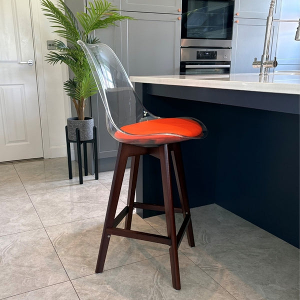 Soho Clear and Orange Plastic Bar Stool with Dark Wood Legs